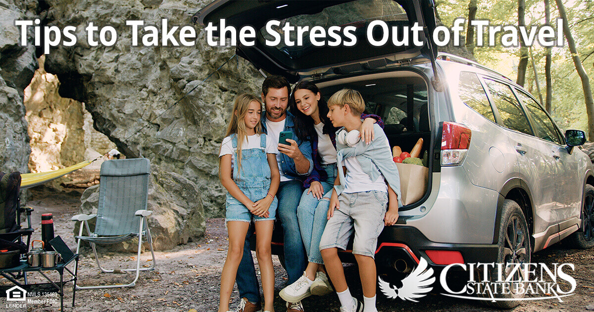 Family traveling to campground in a mini-van